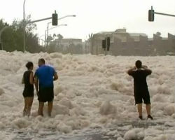 Foam fills Australian town during wild weather after tropical cyclone Oswald